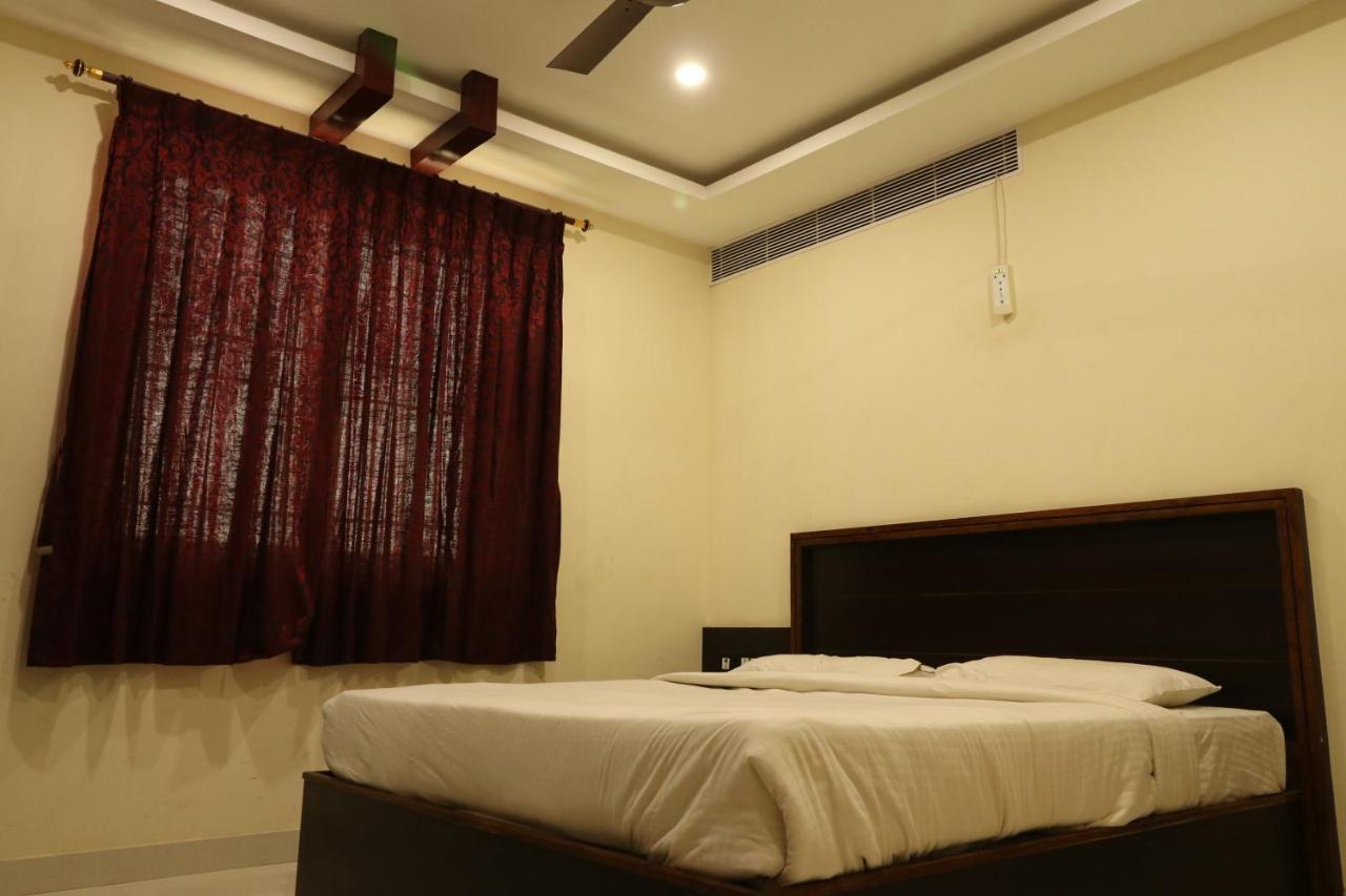 E S Residency Hotel Theni Exterior photo